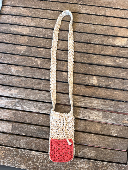 Bandolera beige con bolsillo naranja