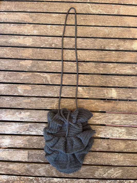 Bandolera gris